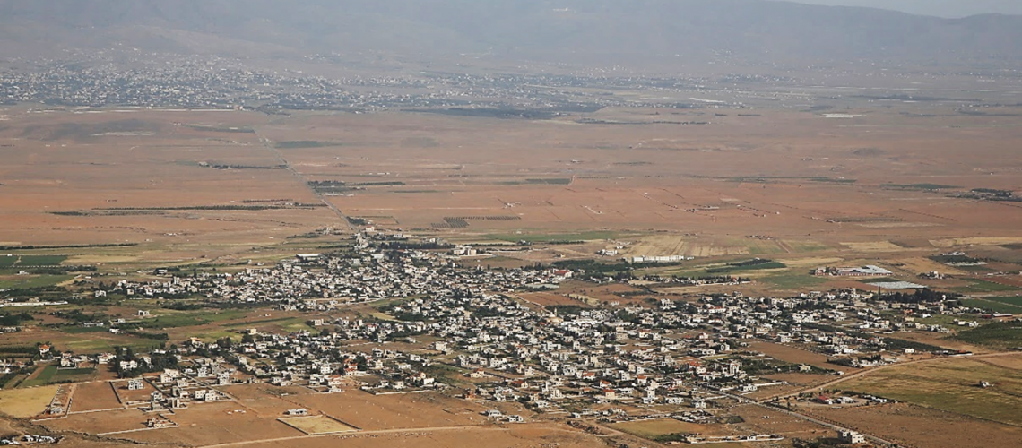 El-Qaa landscape with Hermel and the Lebanon’s Western Mountain Range in the back.
